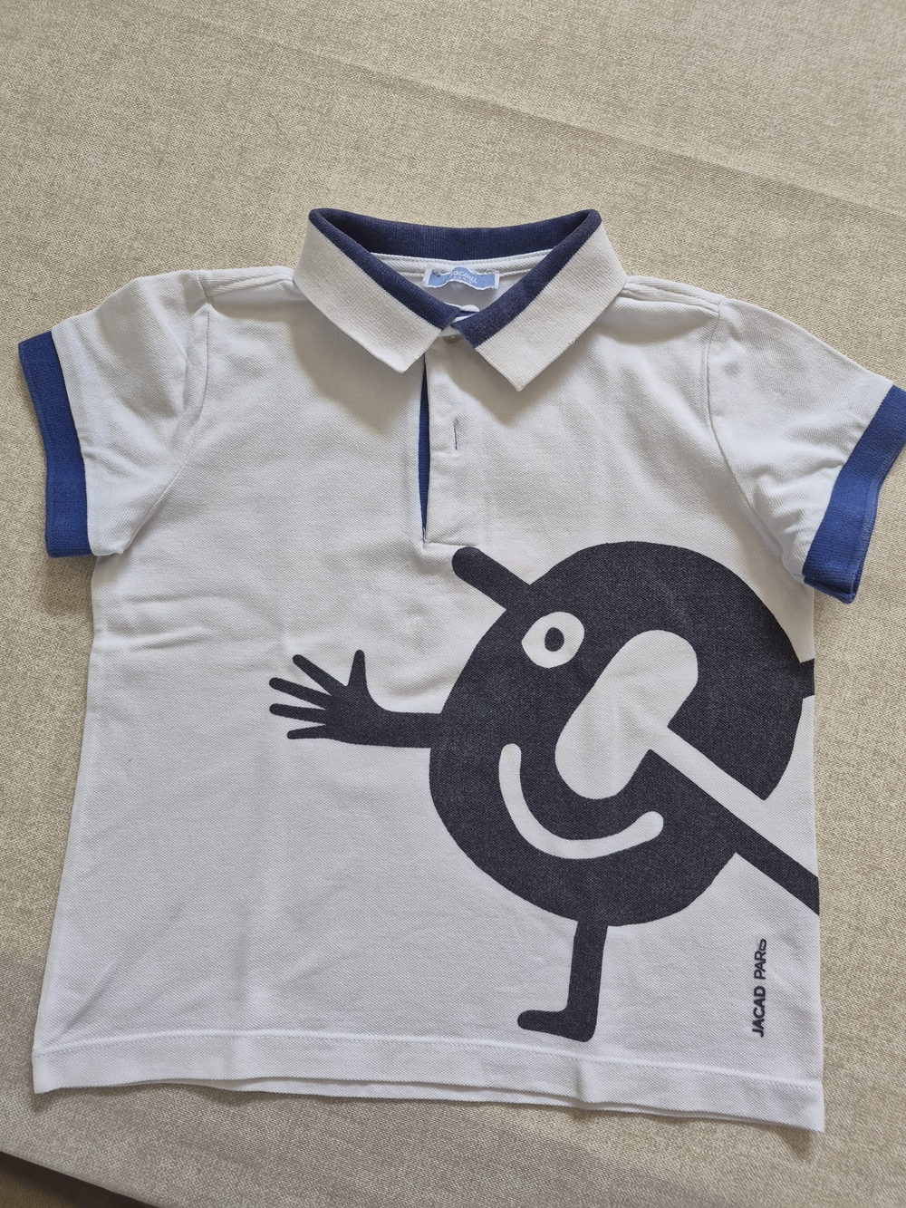 Kids White Polo Shirt with Navy Graphic Trim